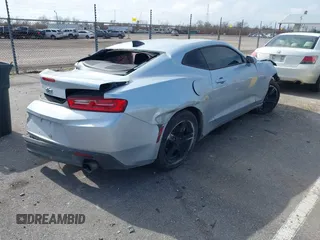 2017 Chevrolet Camaro 1LT with VIN 1G1FB1RX4H0184633, listed as a IAAI auction lot 41453367 with 141,018 mi miles and . Bid and sale history available at carsss.com. Image 4.