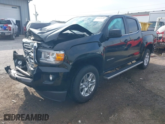 2019 GMC Canyon 4WD SLE z VIN 1GTG6CEN2K1354585, wystawiony jako IAAI lot #42014158 z przebiegiem 34 269 mil mil oraz . Historia ofert i sprzedaży dostępna na DreamBid. Obrazek 2.