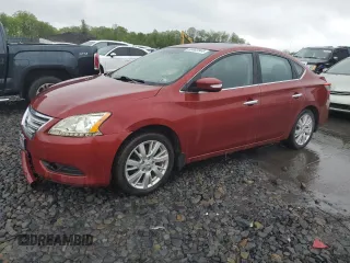 2015 Nissan Sentra SL z VIN 3N1AB7AP2FY212774, wystawiony jako Copart lot #56483865 z przebiegiem 149 461 mil mil oraz Szkoda całkowita • Salvage title. Historia ofert i sprzedaży dostępna na DreamBid. Obrazek 1.