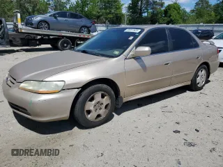 2002 Honda Accord EX z VIN 1HGCG16592A072427, wystawiony jako Copart lot #55317525 z przebiegiem 168 487 mil mil oraz Szkoda całkowita • Salvage title. Historia ofert i sprzedaży dostępna na DreamBid. Obrazek 1.
