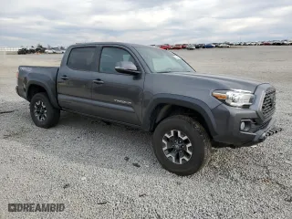2021 Toyota Tacoma 4WD SR with VIN 3TMCZ5AN3MM422826, listed as a Copart auction lot 50305865 with 74,876 mi miles and Salvage Title. Bid and sale history available at carsss.com. Image 4.