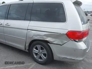 2008 Honda Odyssey Touring with VIN 5FNRL38908B058867, listed as a IAAI auction lot 42126471 with 201,088 mi miles and . Bid and sale history available at DreamBid. Image 6.