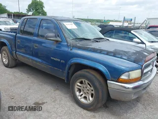 2002 Dodge Dakota SLT z VIN 1B7HL48X22S533364, wystawiony jako IAAI lot #42414807 z przebiegiem 154 993 mil mil oraz . Historia ofert i sprzedaży dostępna na DreamBid. Obrazek 1.