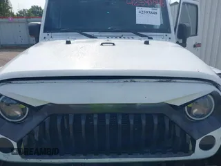 2012 Jeep Wrangler Unlimited Sahara with VIN 1C4BJWEG1CL186407, listed as a IAAI auction lot 42593848 with 178,354 mi miles and . Bid and sale history available at DreamBid. Image 10.