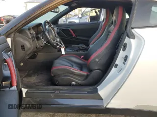 2012 Nissan GT-R Premium z VIN JN1AR5EF3CM251325, wystawiony jako Copart lot #77342524 z przebiegiem 70 923 mil mil oraz Szkoda całkowita • Salvage title. Historia ofert i sprzedaży dostępna na DreamBid. Obrazek 7.