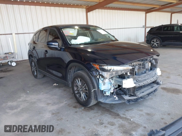 2020 Mazda CX-5 Touring z VIN JM3KFACM2L0802461, wystawiony jako IAAI lot #42148039 z przebiegiem 57 963 mil mil oraz . Historia ofert i sprzedaży dostępna na DreamBid. Obrazek 1.