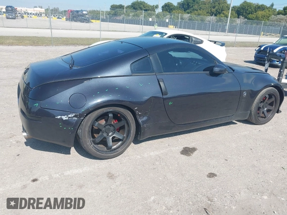 2003 Nissan 350Z Enthusiast with VIN JN1AZ34D83T107831, listed as a IAAI auction lot 41474603 with 135,137 mi miles. Bid and sale history available at carsss.com. Image 6.