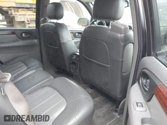 2002 GMC Envoy SLT with VIN 1GKDT13S622506181, listed as a IAAI auction lot 41986061 with 212,583 mi miles. Bid and sale history available at carsss.com. Image 8.