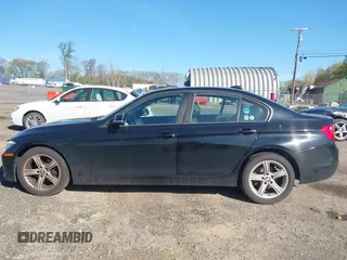 2015 BMW 3 Series 320i with VIN WBA3B1G55FNT04870, listed as a IAAI auction lot 42141211 with 249,720 mi miles. Bid and sale history available at carsss.com. Image 14.