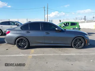 2021 BMW 3 Series 330i z VIN 3MW5R1J08M8B94401, wystawiony jako IAAI lot #41760747 z przebiegiem Nie podano mil oraz . Historia ofert i sprzedaży dostępna na DreamBid. Obrazek 13.