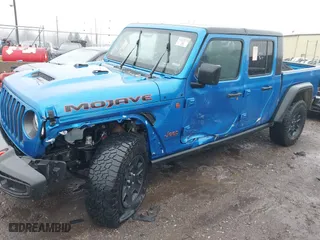 2022 Jeep Gladiator Mojave with VIN 1C6JJTEG1NL128530, listed as a IAAI auction lot 41111344 with 56,119 mi miles. Bid and sale history available at carsss.com. Image 6.