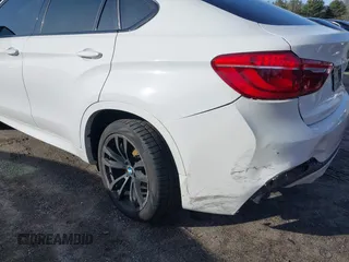 2015 BMW X6 xDrive35i with VIN 5UXKU2C50F0N77117, listed as a IAAI auction lot 41901159 with 104,820 mi miles. Bid and sale history available at carsss.com. Image 12.