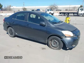 2007 Toyota Yaris with VIN JTDBT923371105048, listed as a IAAI auction lot 41759923 with 166,458 mi miles. Bid and sale history available at carsss.com. Image 1.