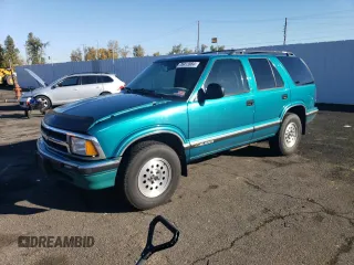 1995 Chevrolet Blazer z VIN 1GNDT13W8S2120237, wystawiony jako Copart lot #78413984 z przebiegiem 146 393 mil mil oraz Szkoda całkowita • Salvage title. Historia ofert i sprzedaży dostępna na DreamBid. Obrazek 1.