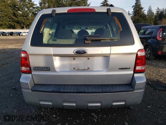 2009 Ford Escape XLS with VIN 1FMCU92709KD07634, listed as a Copart auction lot 42264585 with 155,108 mi miles and Clean title. Bid and sale history available at DreamBid. Image 6.