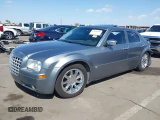 2006 Chrysler 300 C with VIN 2C3KA63H56H313967, listed as a IAAI auction lot 42056998 with 143,592 mi miles and . Bid and sale history available at carsss.com. Image 2.