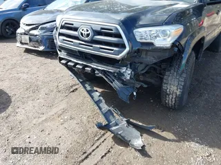 2017 Toyota Tacoma SR5 with VIN 5TFAZ5CN3HX040199, listed as a IAAI auction lot 41734051 with 107,665 mi miles and . Bid and sale history available at carsss.com. Image 6.