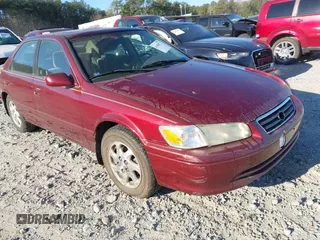 2001 Toyota Camry CE with VIN JT2BG22K710602080, listed as a IAAI auction lot 41858573 with 169,774 mi miles and . Bid and sale history available at carsss.com. Image 1.