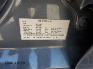 2021 Tesla Model Y Long Range z VIN 5YJYGDEE6MF074492, wystawiony jako Copart lot #54960655 z przebiegiem 57 468 mil mil oraz Szkody całkowita. Historia ofert i sprzedaży dostępna na DreamBid. Obrazek 12.