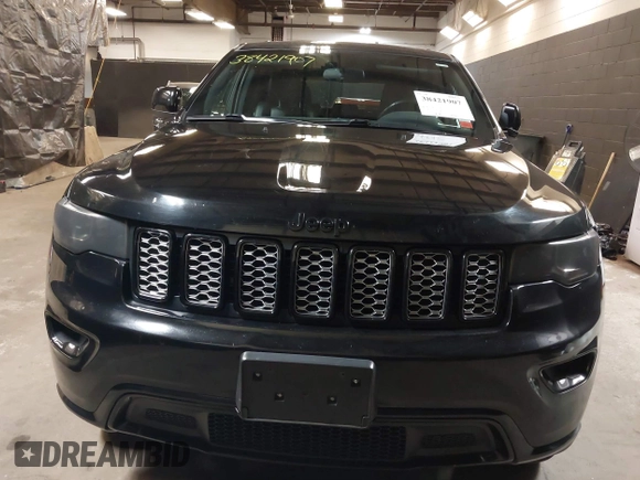 2021 Jeep Grand Cherokee Laredo X with VIN 1C4RJFAG3MC647726, listed as a IAAI auction lot 38421907 with 56,514 mi miles and . Bid and sale history available at DreamBid. Image 12.