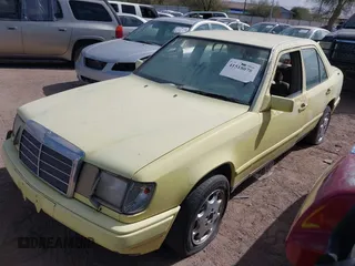 1987 Mercedes-Benz 300 with VIN WDBEA30DXHA466708, listed as a IAAI auction lot 41518078 with 166,202 mi miles. Bid and sale history available at carsss.com. Image 2.