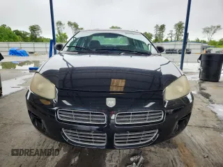 2002 Dodge Stratus SE z VIN 1B3EL36R02N198011, wystawiony jako Copart lot #58213505 z przebiegiem 104 464 mil mil oraz Tytuł czysty. Historia ofert i sprzedaży dostępna na DreamBid. Obrazek 5.