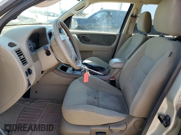 2006 Ford Escape XLT with VIN 1FMCU03116KA69312, listed as a Copart auction lot 70773514 with 164,079 mi miles and Salvage Title. Bid and sale history available at carsss.com. Image 7.