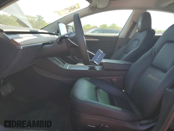 2023 Tesla Model 3 z VIN 5YJ3E1EA1PF547070, wystawiony jako Copart lot #55793205 z przebiegiem 38 591 mil mil oraz Szkoda całkowita • Salvage title. Historia ofert i sprzedaży dostępna na DreamBid. Obrazek 7.