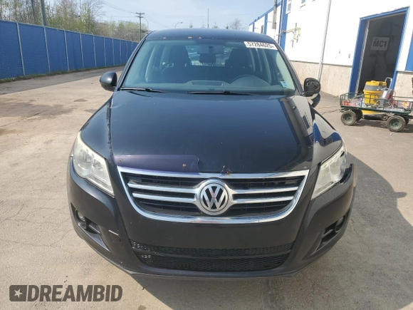 2011 Volkswagen Tiguan with VIN WVGCV7AX8BW511387, listed as a Copart auction lot 57284625 with 284,102 mi miles and Salvage title. Bid and sale history available at DreamBid. Image 5.