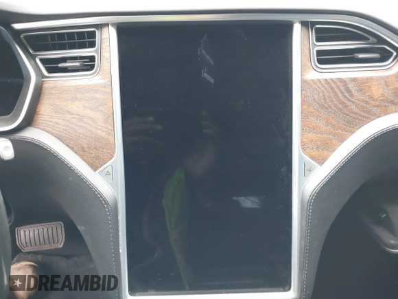 2017 Tesla Model S 100D with VIN 5YJSA1E25HF215778, listed as a IAAI auction lot 41692605 with Not Provided miles and . Bid and sale history available at DreamBid. Image 17.