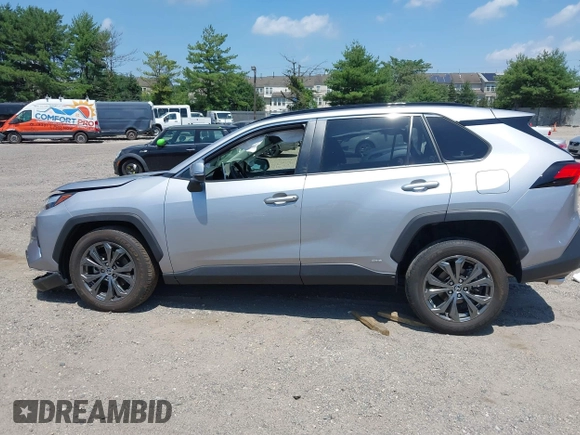 2022 Toyota RAV4 Hybrid XLE Premium with VIN JTMB6RFV1ND063963, listed as a IAAI auction lot 42550907 with 35,012 mi miles and . Bid and sale history available at DreamBid. Image 14.