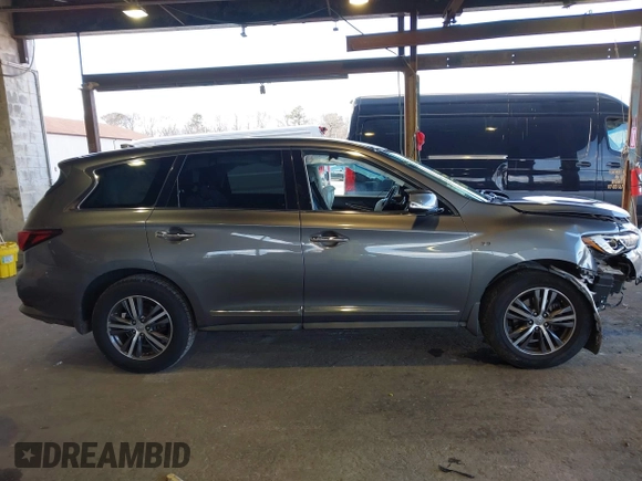 2019 Infiniti QX60 Luxe with VIN 5N1DL0MM8KC558679, listed as a IAAI auction lot 41973649 with 51,867 mi miles and . Bid and sale history available at DreamBid. Image 14.