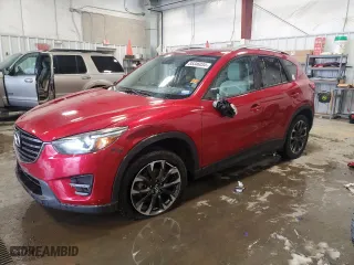 2016 Mazda CX-5 Grand Touring with VIN JM3KE2DY0G0701743, listed as a Copart auction lot 85346034 with 121,955 mi miles and Salvage Title. Bid and sale history available at carsss.com. Image 1.