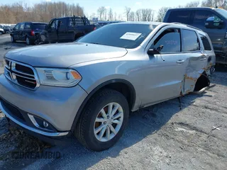 2014 Dodge Durango SXT z VIN 1C4RDJAG4EC514677, wystawiony jako IAAI lot #42059637 z przebiegiem 226 185 mil mil oraz . Historia ofert i sprzedaży dostępna na DreamBid. Obrazek 2.
