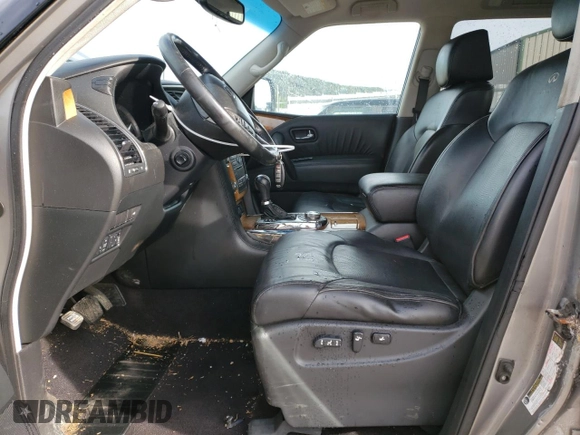 2012 Infiniti QX56 7-passenger with VIN JN8AZ2NE3C9017910, listed as a Copart auction lot 54199494 with 242,851 mi miles and Salvage Title. Bid and sale history available at carsss.com. Image 7.
