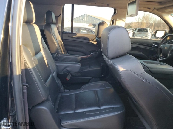 2017 Chevrolet Suburban Premier with VIN 1GNSKJKC5HR303600, listed as a Copart auction lot 83395644 with 124,465 mi miles and Salvage Title. Bid and sale history available at carsss.com. Image 11.