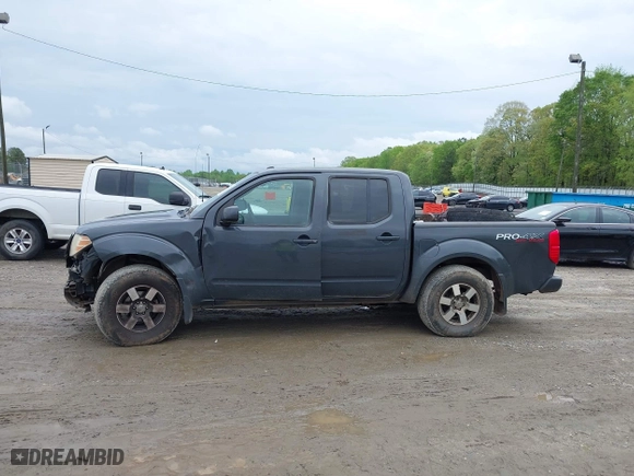 2011 Nissan Frontier PRO-4X with VIN 1N6AD0EV0BC442076, listed as a IAAI auction lot 41982227 with 345,538 mi miles. Bid and sale history available at carsss.com. Image 6.