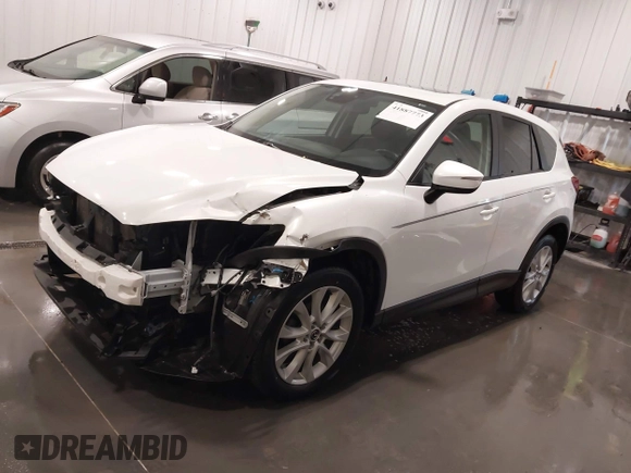 2015 Mazda CX-5 Grand Touring with VIN JM3KE4DY4F0495627, listed as a IAAI auction lot 41887773 with 130,421 mi miles. Bid and sale history available at carsss.com. Image 19.