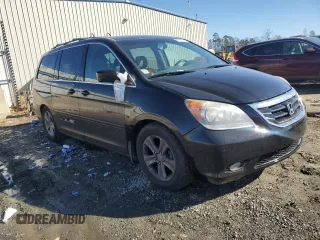 2010 Honda Odyssey Touring with VIN 5FNRL3H91AB030422, listed as a Copart auction lot 88737745 with 0 mi miles and Salvage Title. Bid and sale history available at carsss.com. Image 4.