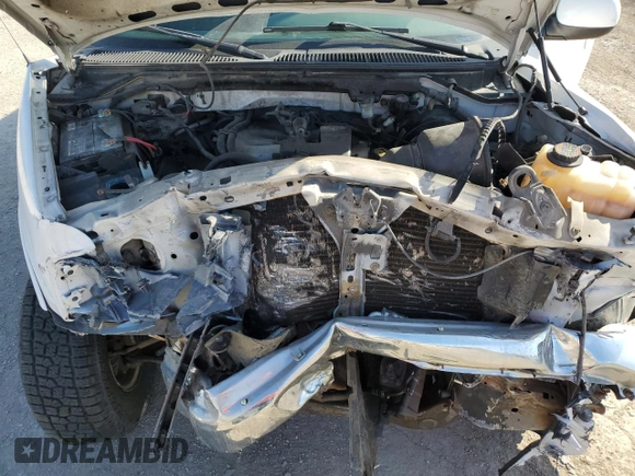 2000 Ford F-150 XL with VIN 1FTZF1825YKB19373, listed as a Copart auction lot 52078555 with 124,452 mi miles and Salvage title. Bid and sale history available at DreamBid. Image 13.