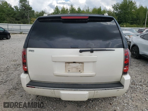 2011 GMC Yukon Denali with VIN 1GKS1EEFXBR313625, listed as a Copart auction lot 72634294 with 129,834 mi miles and Salvage Title. Bid and sale history available at carsss.com. Image 6.
