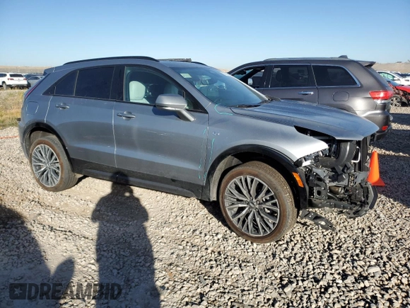 2024 Cadillac XT4 AWD Sport with VIN 1GYFZFR49RF134390, listed as a Copart auction lot 73012834 with 6,092 mi miles and Salvage title. Bid and sale history available at DreamBid. Image 4.
