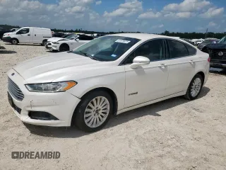 2013 Ford Fusion SE Hybrid z VIN 3FA6P0LU4DR219124, wystawiony jako Copart lot #61978375 z przebiegiem 241 184 mil mil oraz Czysty tytuł • Clean title. Historia ofert i sprzedaży dostępna na DreamBid. Obrazek 1.
