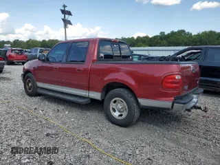 2001 Ford F-150 XLT with VIN 1FTRW07LX1KD65474, listed as a Copart auction lot 61474655 with 361,023 mi miles and Salvage title. Bid and sale history available at DreamBid. Image 2.