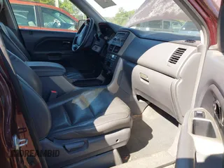 2007 Honda Pilot EX-L with VIN 5FNYF18547B006094, listed as a IAAI auction lot 42297719 with 235,632 mi miles and . Bid and sale history available at DreamBid. Image 5.