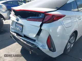2017 Toyota Prius Plus z VIN JTDKARFP5H3054435, wystawiony jako IAAI lot #42316988 z przebiegiem 82 036 mil mil oraz . Historia ofert i sprzedaży dostępna na DreamBid. Obrazek 12.