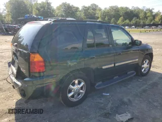2003 GMC Envoy SLT with VIN 1GKDT13S032396374, listed as a Copart auction lot 74675134 with 115,280 mi miles and Salvage Title. Bid and sale history available at carsss.com. Image 3.
