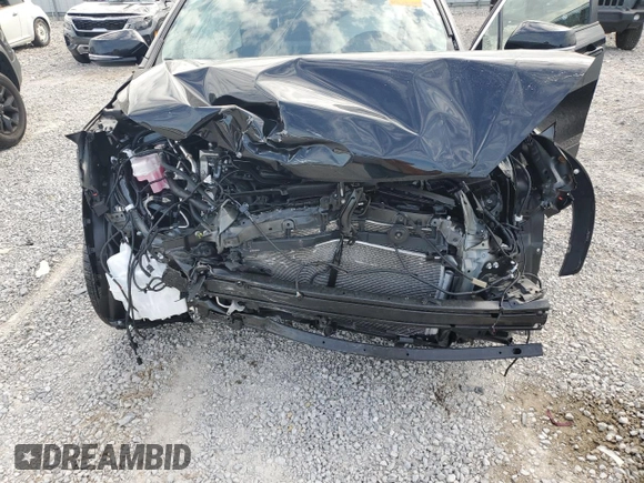2024 Toyota Corolla Cross XLE with VIN 7MUEAABG2RV108218, listed as a Copart auction lot 54433915 with 7,091 mi miles and Salvage title. Bid and sale history available at DreamBid. Image 12.