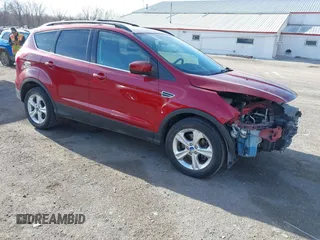 2013 Ford Escape SE z VIN 1FMCU9GXXDUC32561, wystawiony jako IAAI lot #41797455 z przebiegiem 134 934 mil mil oraz . Historia ofert i sprzedaży dostępna na DreamBid. Obrazek 1.