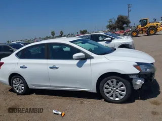 2018 Nissan Sentra S z VIN 3N1AB7AP6JY301076, wystawiony jako IAAI lot #42300529 z przebiegiem 117 730 mil mil oraz . Historia ofert i sprzedaży dostępna na DreamBid. Obrazek 13.